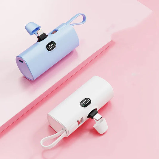 Capsule digital display wireless power bank showing battery percentage on screen, compact 79x34x26mm design with integrated plug