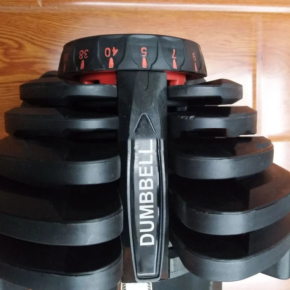 Black automatic adjustable dumbbell with dial weight selector showing 5-25kg range