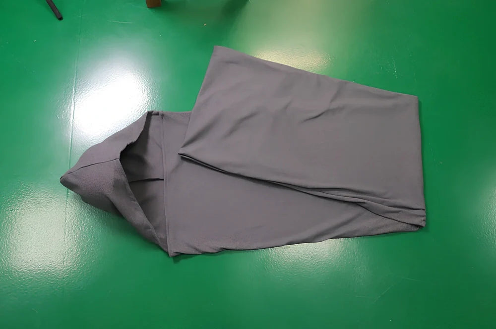 Sleep Pod Move grey wearable blanket with foot pocket showing four size options from 140x35cm to 185x50cm