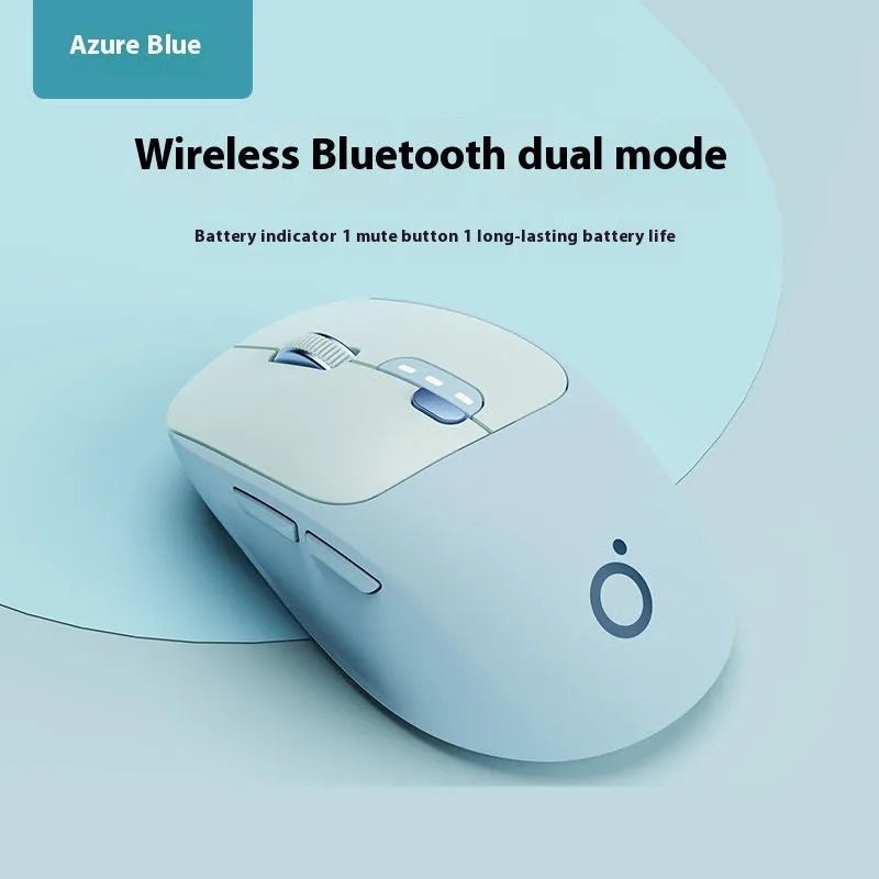 Mute wireless Bluetooth computer mouse in Matcha Green colour on a desk, showing its compact size and 5-button layout.