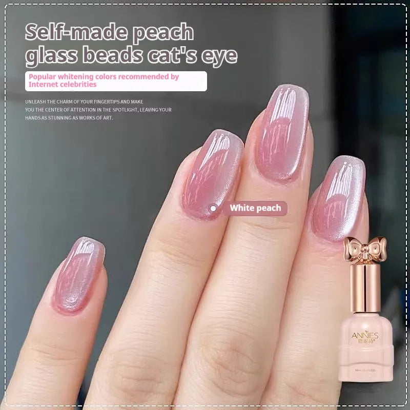 Bottle of micro glass bead cat's eye gel nail polish for magnetic nail art.