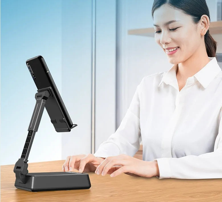 Black mobile phone broadcasting stand with Bluetooth speaker and HD microphone on desk