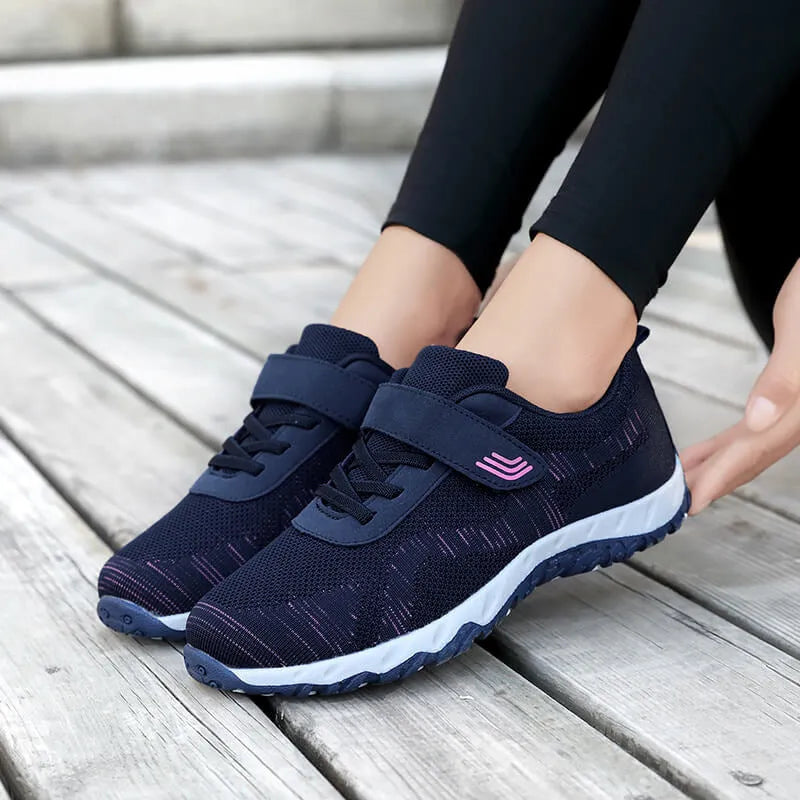 Women's grey purple soft sole velcro shoes with a low-top mesh upper and wedge heel.