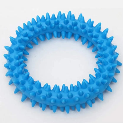 TPR spiky circle ring dog chew toy in assorted colours showing dental cleaning nubs