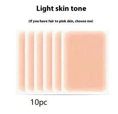 Tattoo cover patch and a 130mm long concealer brush on a table, with colour option swatches visible.