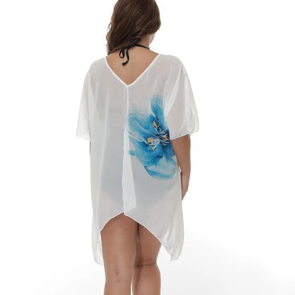 White plus size loose beach cover-up blouse for sun protection.