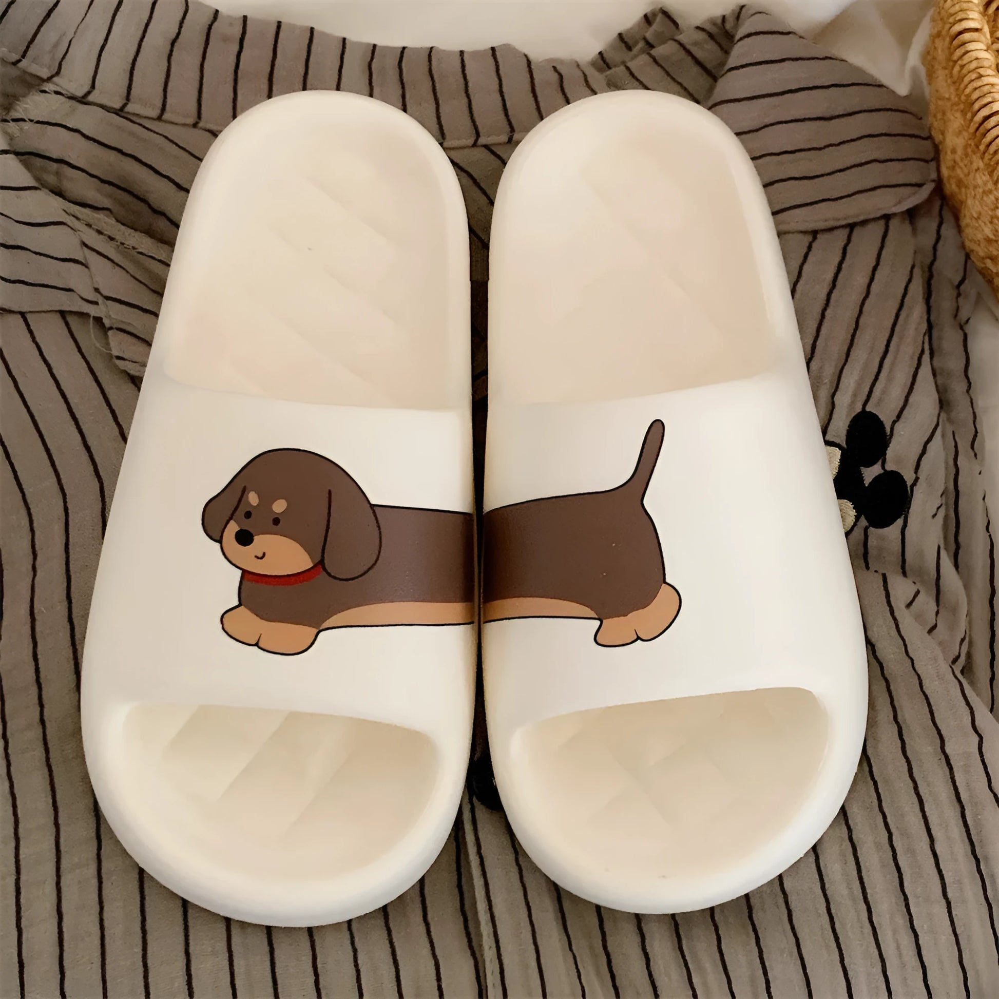 Pair of EVA couple household slippers in thickening flip-flop style showing soft sole construction