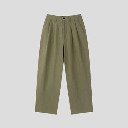 Men's apricot cotton linen trousers with elastic waistband and pencil leg opening on hanger