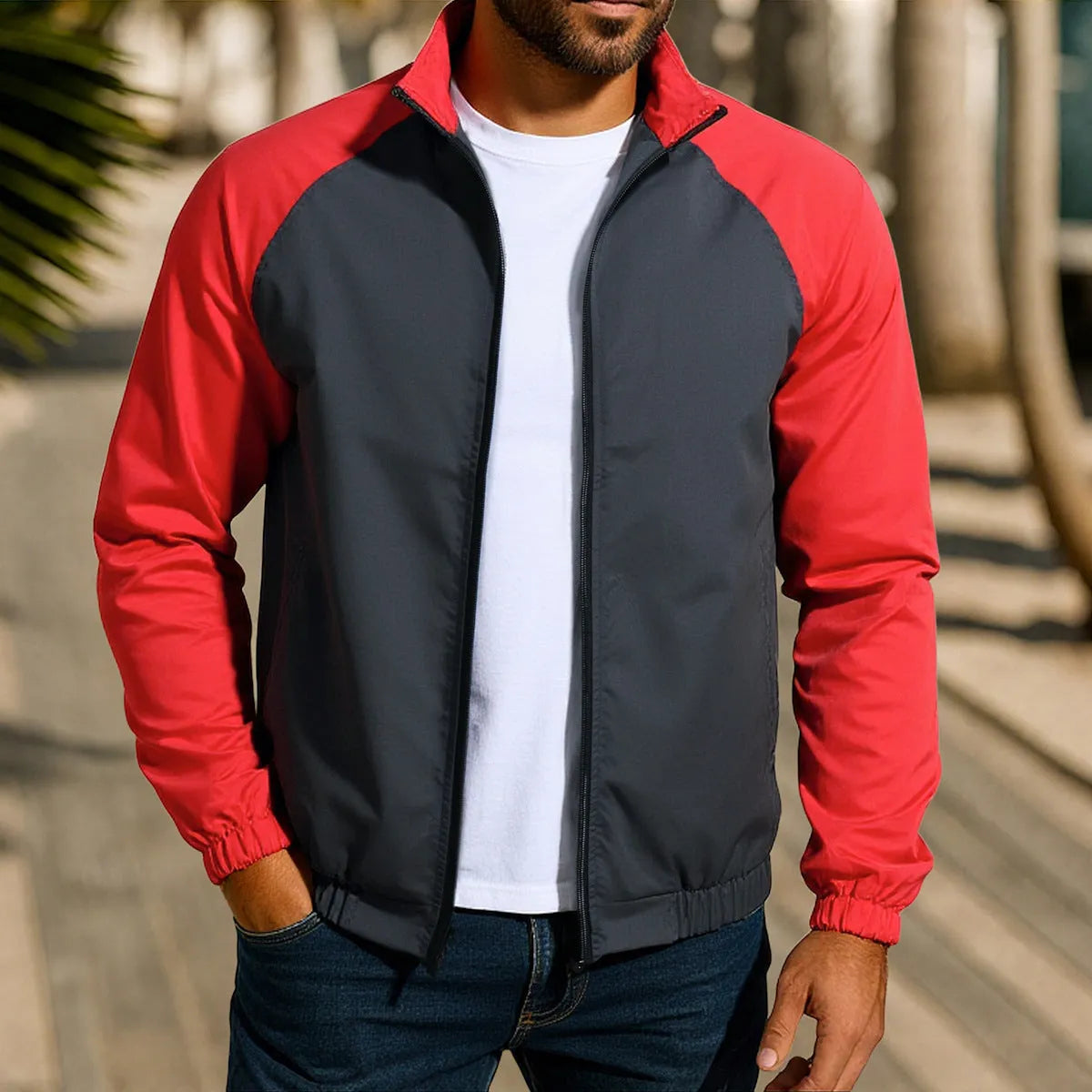 Men's red stand collar casual jacket with raglan sleeves on a hanger.