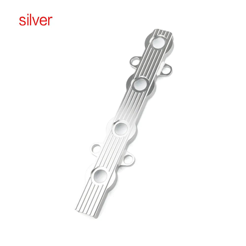 Aluminium alloy car engine wiring harness housing in blue, red, and silver colours