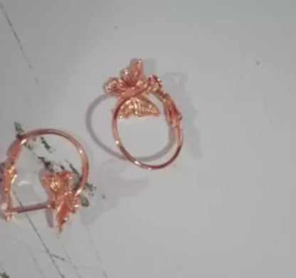 Butterfly earrings with elegant bow styling in rose gold and gold finishes