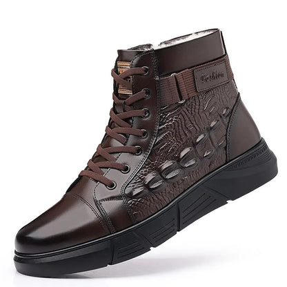 Black fur-lined genuine leather lace-up snow boots with a textured rubber sole on a wooden floor.