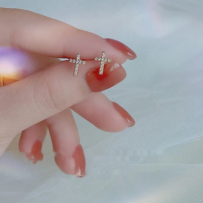 Stainless steel cross earrings with zircon inlay in white gold and gold finishes