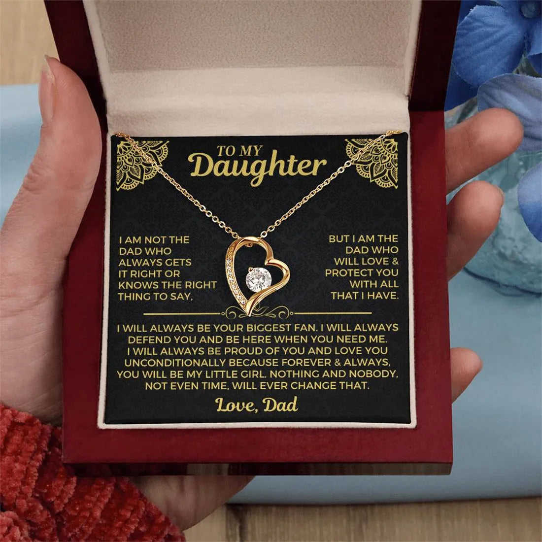 Silver hollow openwork heart pendant necklace presented in a gift box with a card.