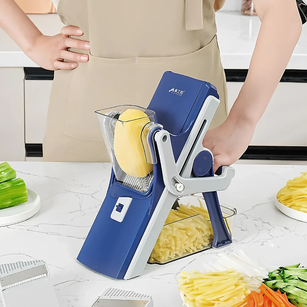 Purple kitchen vegetable chopper with stainless steel blades and wire planer attachment on 41cm workspace