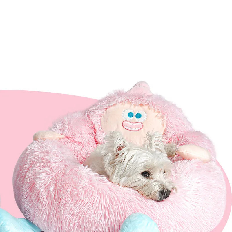Grey plush donut-shaped pet nest bed with raised edges for a cat or dog.