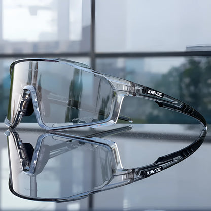 Photochromic cycling sports goggles with a semi-rimless TR90 frame and adaptive tint lens.