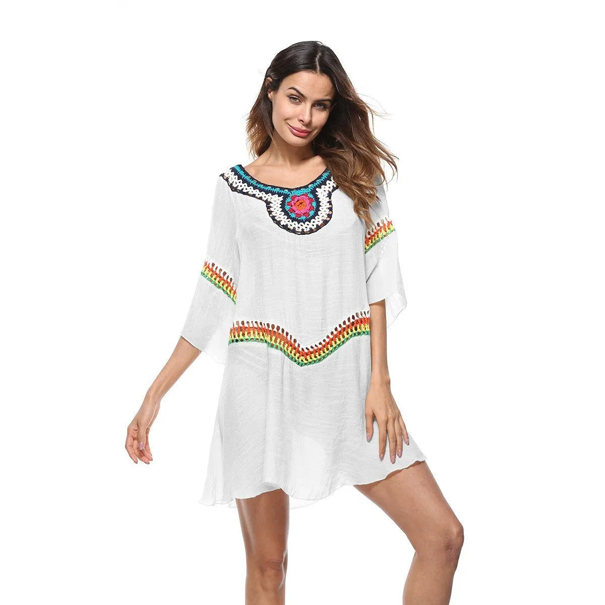 Women's crocheted ethnic style beach cover-up top in apricot colour, for sun protection.