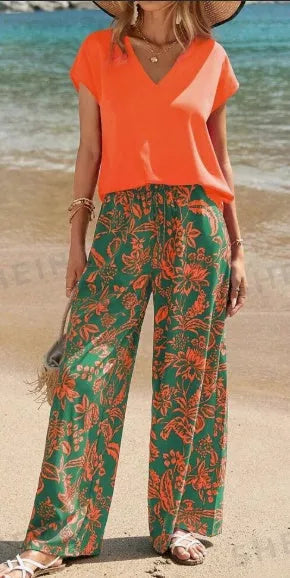 Women's solid V-neck short sleeve top and botanical print pants set in woven fabric