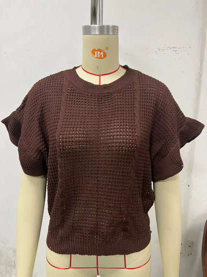 Twisted string pattern knitted pullover sweater with ruffled short sleeves in loose fit.