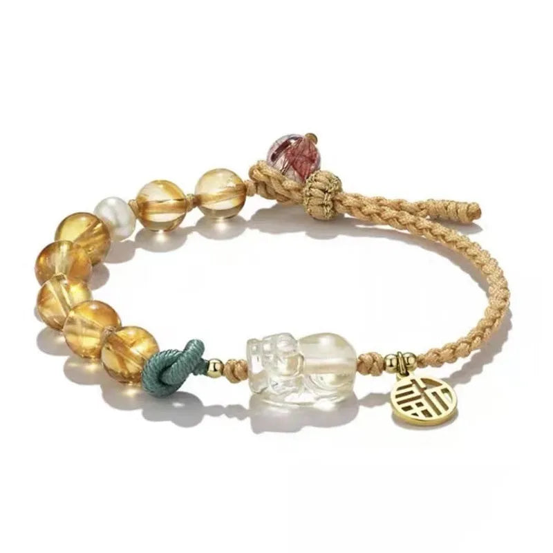 Hand-woven citrine crystal bracelet with animal zodiac designs in natural unisex style