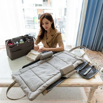 Versatile Folding Mother and Baby Diaper Bag with large capacity, foldable design, and multiple compartments for organizing baby essentials