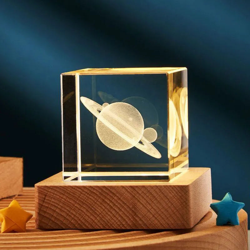 3D crystal cube night lamp showing transparent glass with internal engraving and warm light illumination