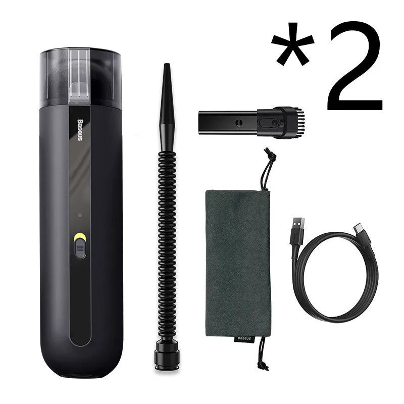 BASEUS handheld car vacuum cleaner in black with blowing hose attachment, showing compact size and dust bin