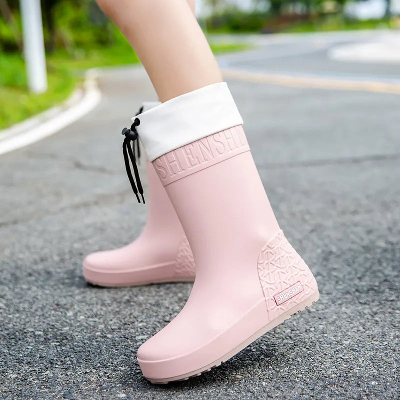 Women's non-slip wear-resistant rain boots made from durable PVC in solid colours including apricot, black, brown, and pink waterproof mouth, available in sizes 36 to 40 for reliable wet weather footwear