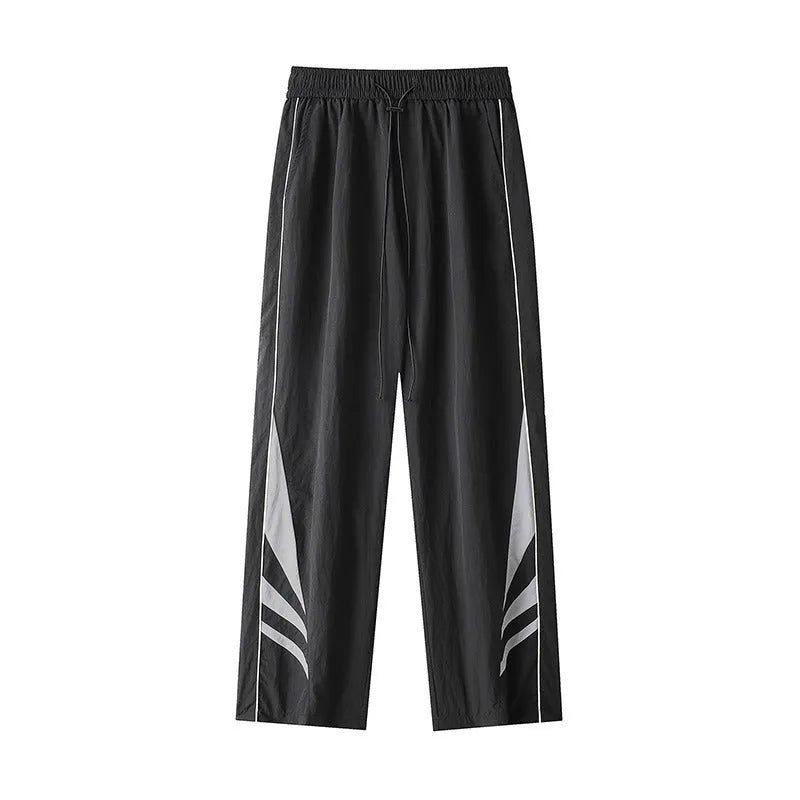 Men's black straight-leg trousers with non-iron fabric, elastic waistband, and plus sizes for summer wear