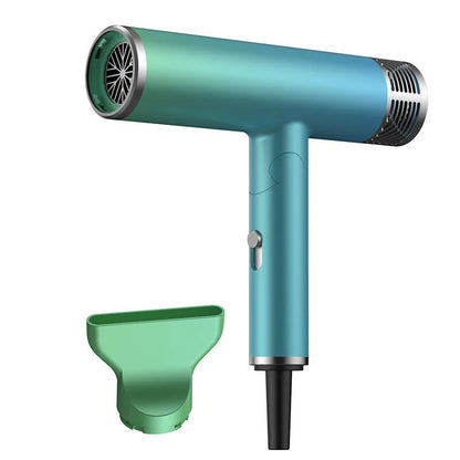 Green and purple foldable hair dryer with collapsed handle showing compact travel size