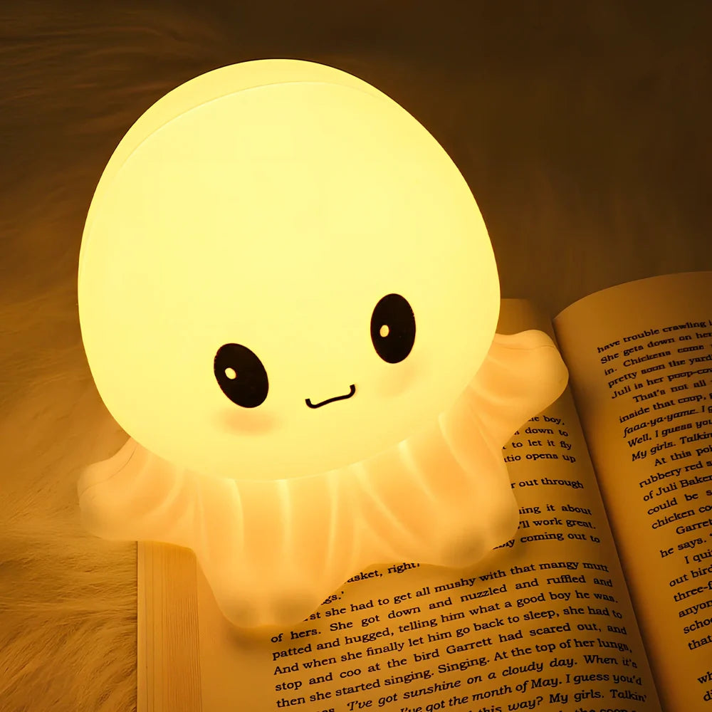 White jellyfish-shaped night light with octopus tentacle details and rechargeable lighting modes