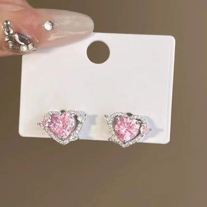 Guardian Heart white K coloured copper stud earrings with heart shape design