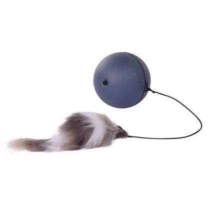 Automatic self-rolling cat ball toy in blue-orange and grey colours on indoor floor
