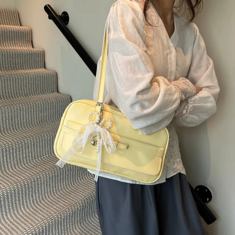 PU single-shoulder flap bag in horizontal square shape with mobile phone compartment and bow decorations