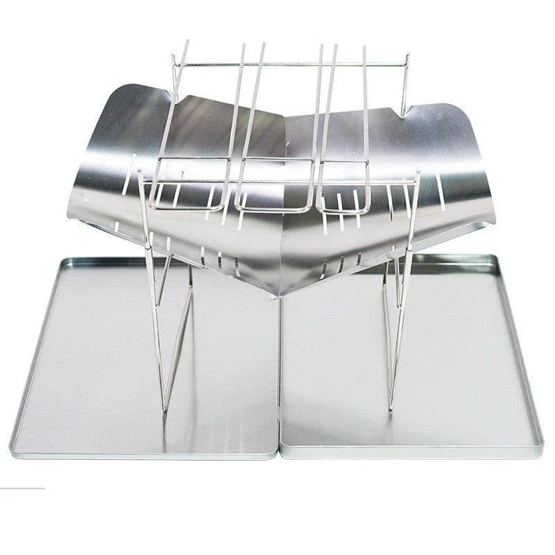 Portable folding outdoor camping stove with grill, made of titanium and stainless steel for durable and versatile outdoor cooking