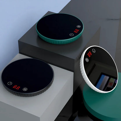 Black electric cup warmer with digital display showing temperature, 115mm diameter, 20mm thickness