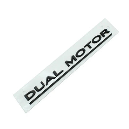 Model 3 car bumper sticker measuring 19cm by 3cm in ABS plastic with matte black and red stripe design