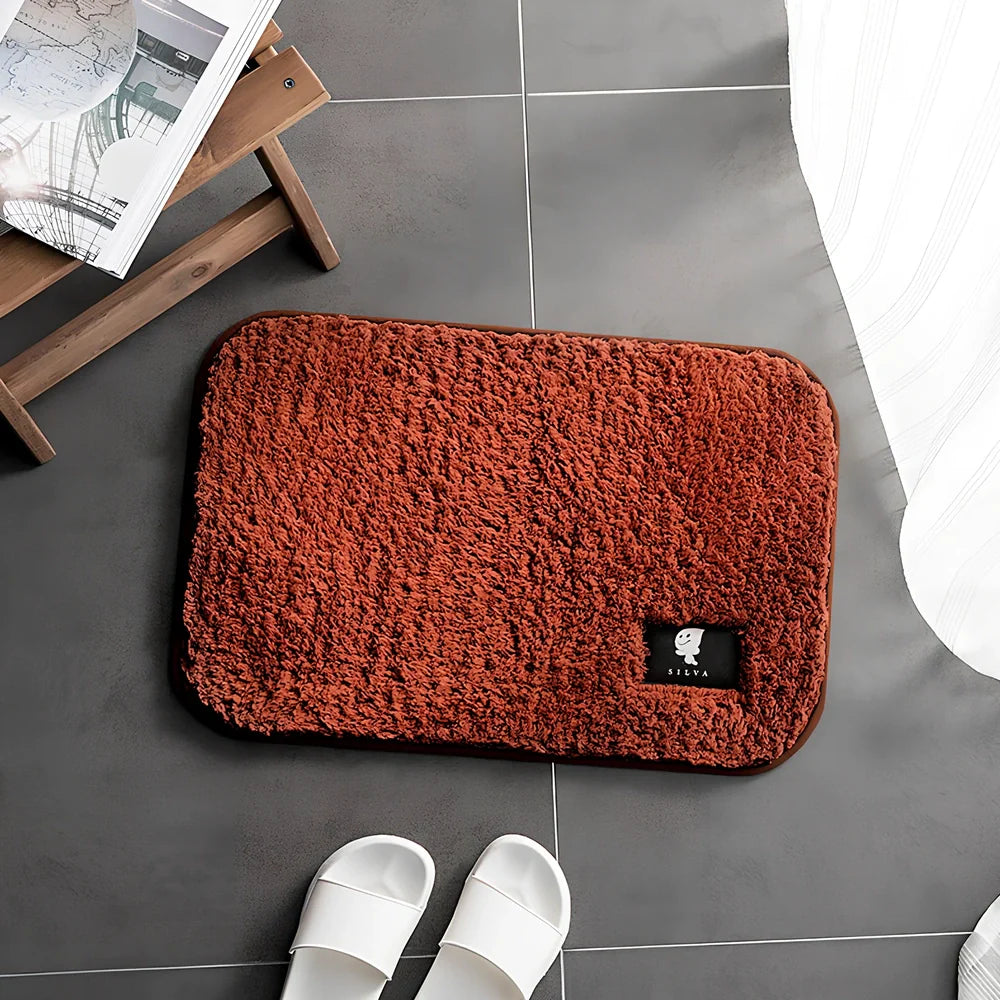 Rectangular polyester anti-slip mat in beige colour for bathroom use with non-woven construction