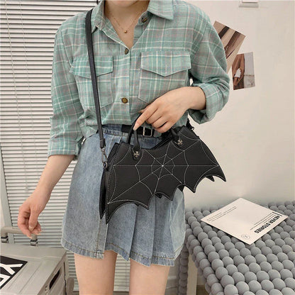 Stylish Halloween spider web crossbody bag in various colors, including black, white, brown, pink, and purple