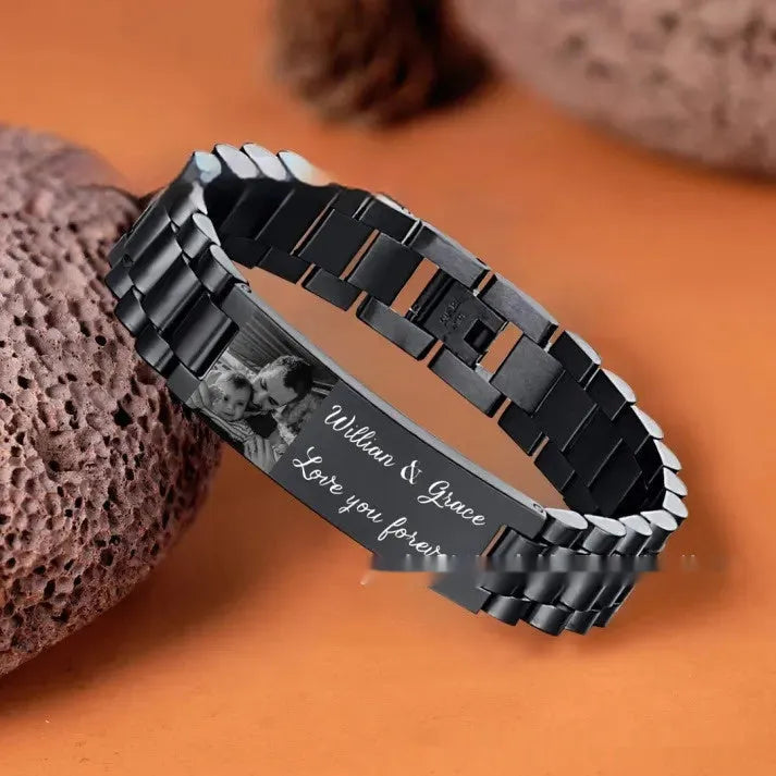 Curved heart-shaped titanium steel bracelet with electroplated lettering, presented in gift box.