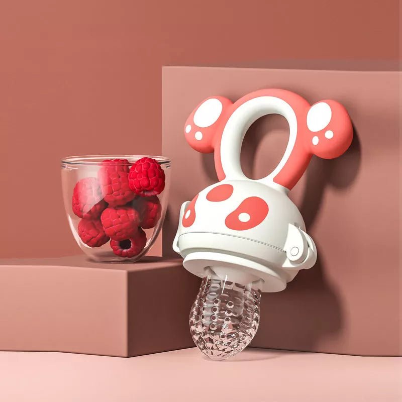 Dual-purpose baby food feeder in blue and red for safe fruit and vegetable introduction