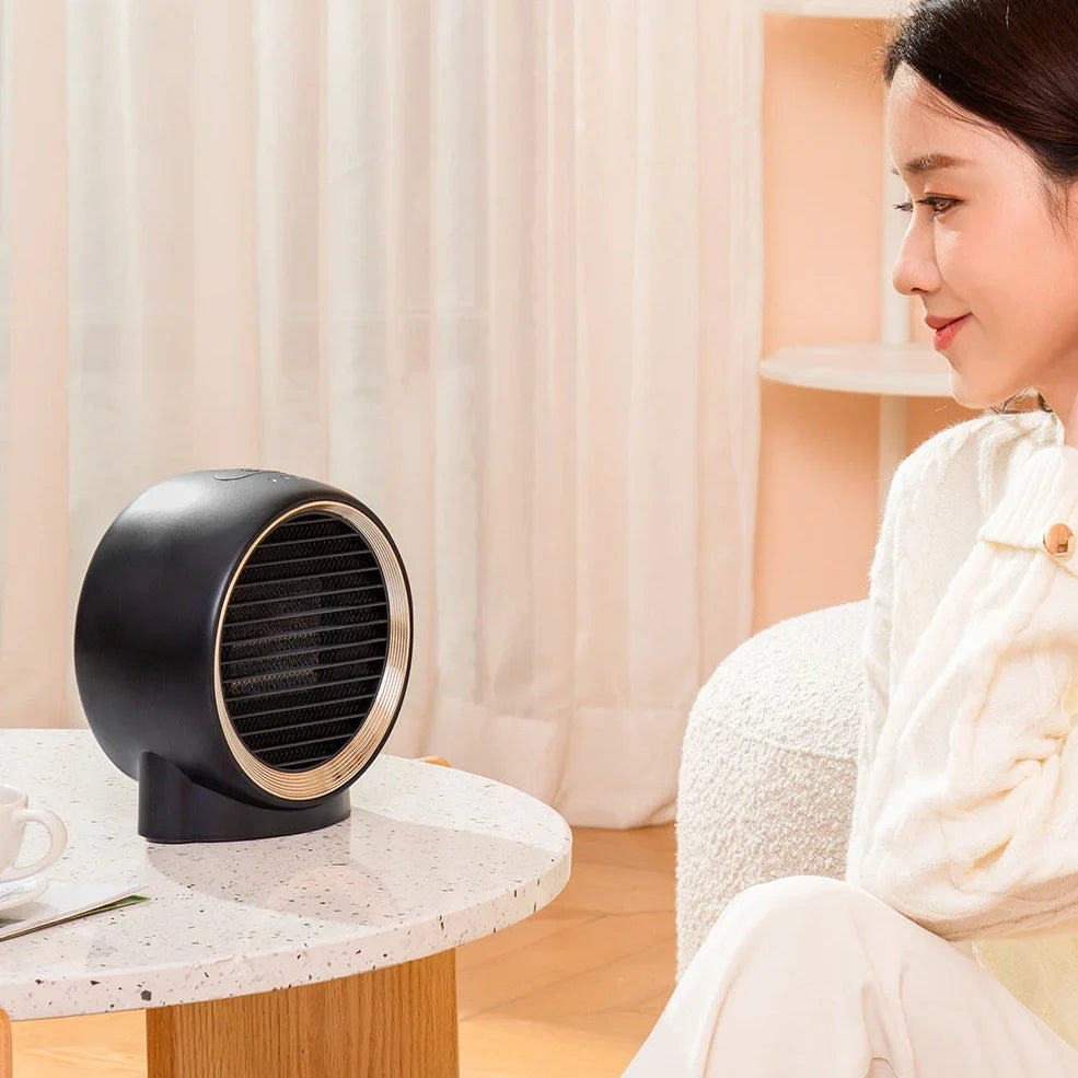 Compact white desktop fan heater measuring 184.5mm wide with PTC ceramic heating technology