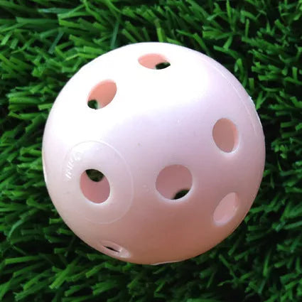 Hollow plastic golf practice balls in various colors for indoor use