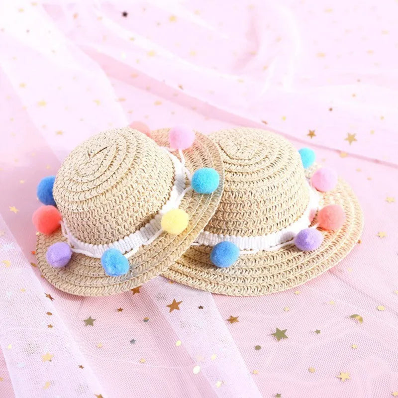 Handmade adjustable bowknot paper hat for a dog or cat, shown in a cartoon style with an elastic fastening loop.