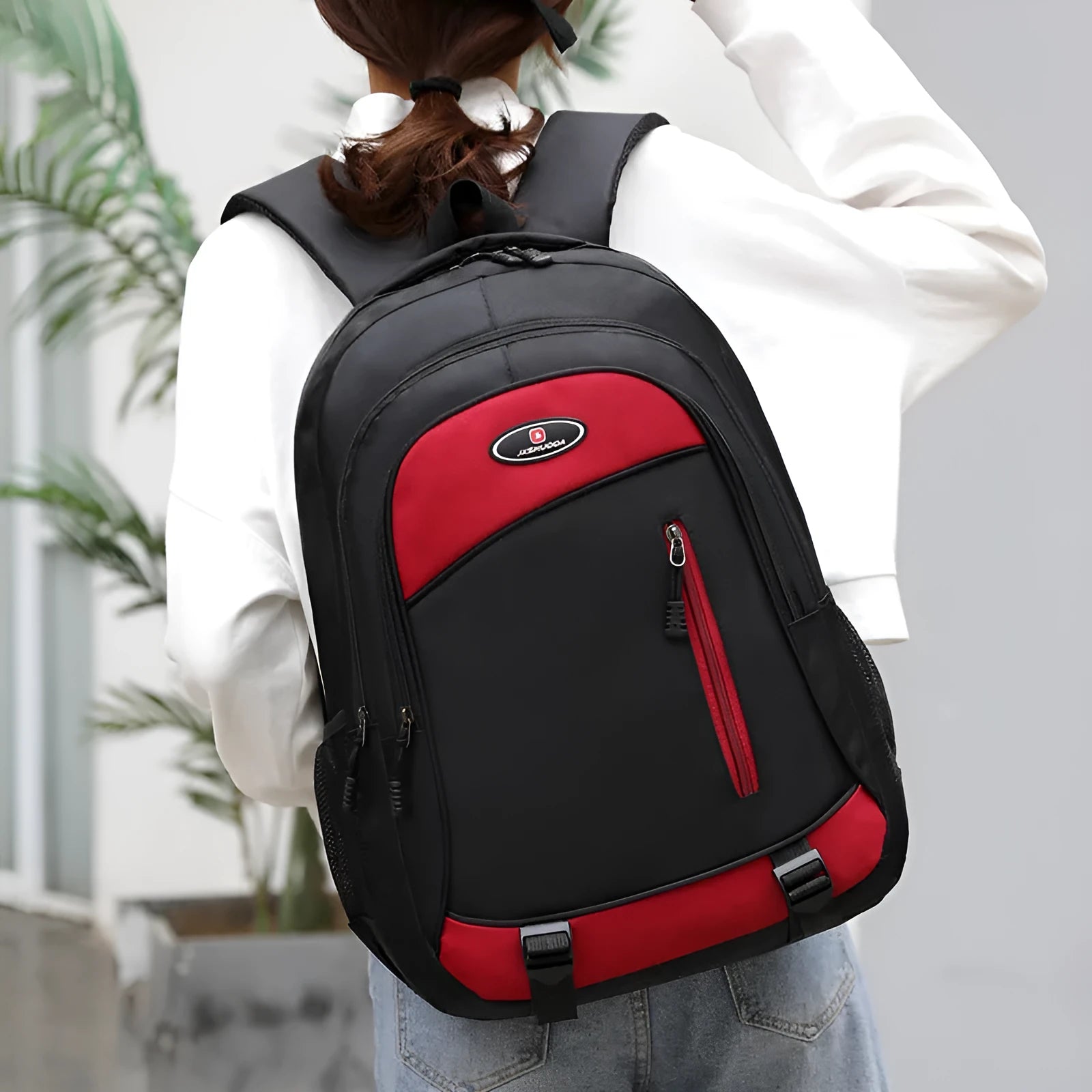 Waterproof nylon high school backpack with air-cushioned straps in black, red, blue, or grey colours