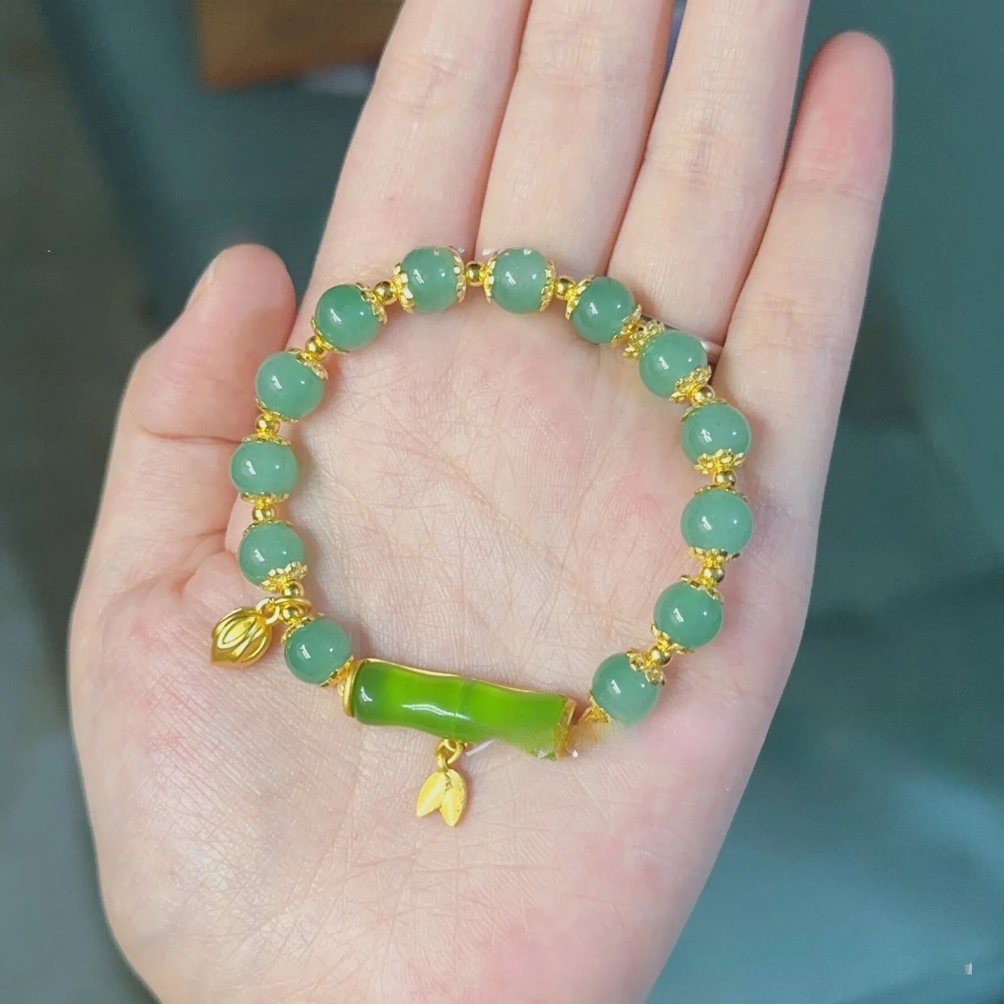 Retro bracelet with Ruyi flower design in glass and coloured glaze beads with electroplated accents