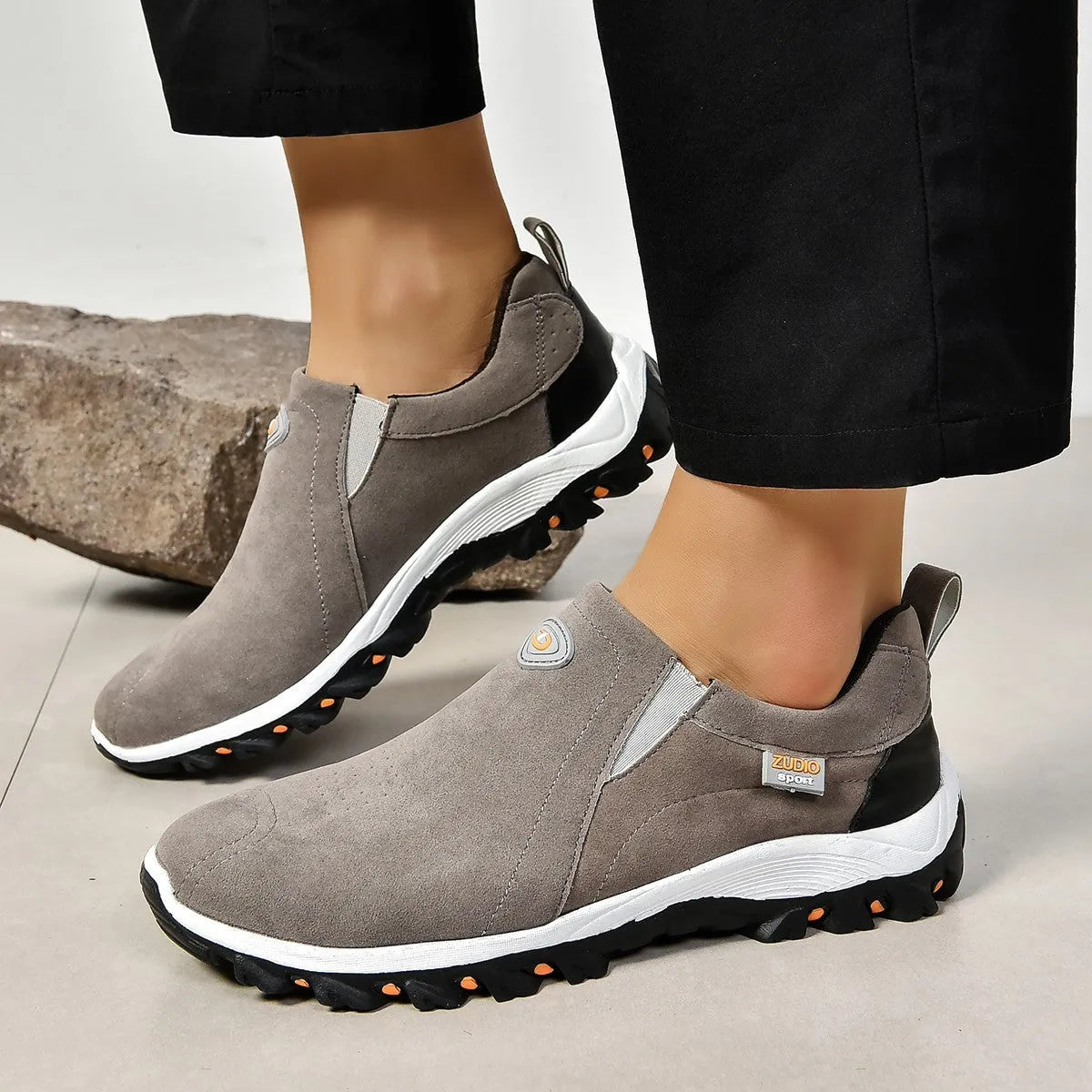 Men's round head shallow mouth thin slip-on shoes in black, blue, gray, green, and light brown on a white background.