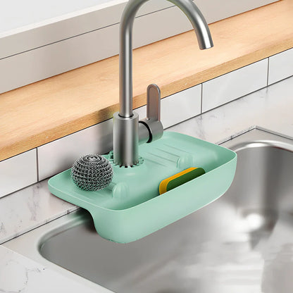 TPE kitchen drain rack with irregular shape measuring 27x14x5cm in orange colour