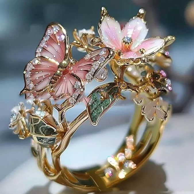 Adjustable crystal butterfly flower ring in gold, silver, and rose gold finishes